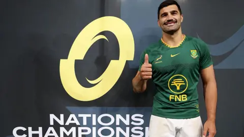 Damian de Allende poses after being named man of the match