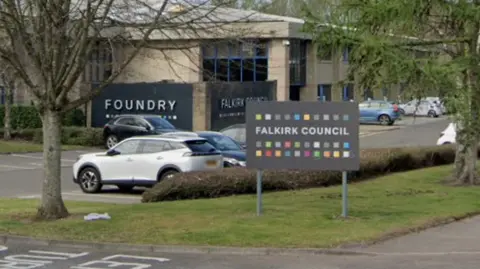 Google A sand-coloured building with a sign outside that reads Falkirk Council