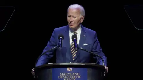 Joe Biden is talking to the audience.