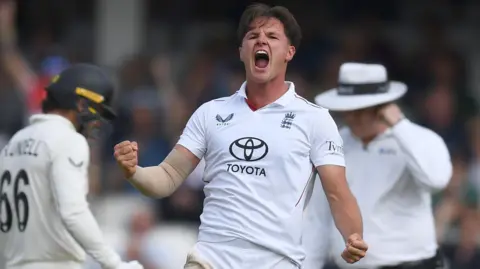 England fast bowler Sonny Baker celebrates taking a wicket