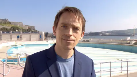 Laurens Gettert, CTO of Ocean OS, standing in front of Tinside Pool in Plymouth