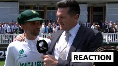 South Africa's Keshav Maharaj  with Graeme Smith