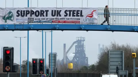 Reuters A Unite banner in Port Talbot