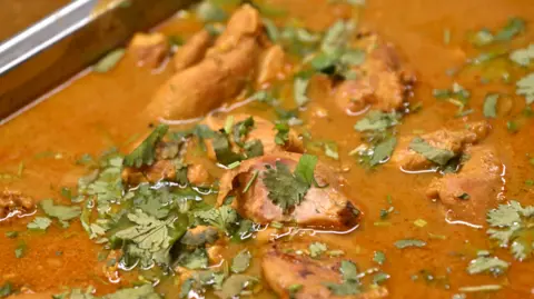 Getty Images A generic close-up image of chicken curry in a container.