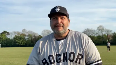 Antonio Narvaez with a Bognor baseball top on in sunny conditions. 