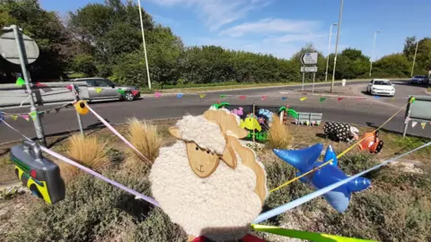 4 Sheep's Sake Roundabout with sheep themed decorations