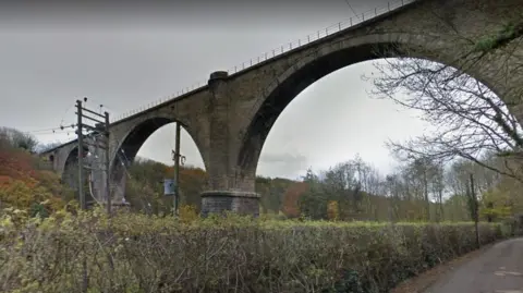 Google Victoria Viaduct - a large stone-built structure with several arches. Fencing runs along the top.