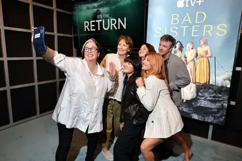 Getty Images Dearbhla Walsh, Fiona Shaw, Thaddea Graham, Sarah Greene, Sharon Horgan and Barry Ward pose for a selfie at the launch of the second series of Bad Sisters