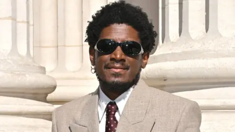 Labrinth attends the Saint Laurent Menswear Spring/Summer 2026 show as part of Paris Fashion Week on June 24, 2025 in Paris, France.