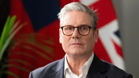 Reuters British Prime Minister Keir Starmer during a TV interview at the Commonwealth Heads of Government Meeting, in Samoa.