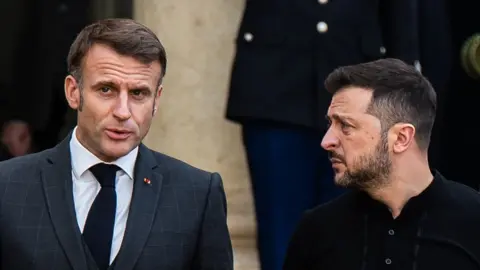 Getty Images French President Emmanuel Macron and Ukrainian President Volodymyr Zelensky at the Elysee Palace during the first bilateral summit of Zelensky's European tour in Paris, France, on October 10, 2024. 