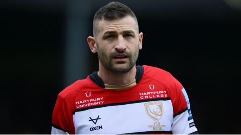 Jonny May standing on the field during a match