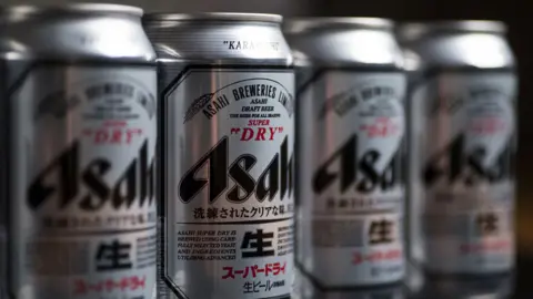 Getty Images Four Asahi beer cans close up.