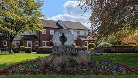 A village sign for Willaston.