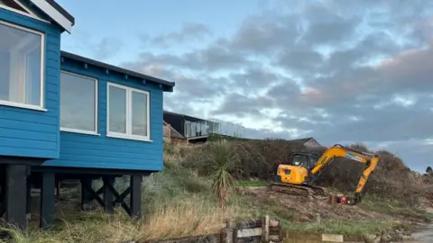 Andrew Turner/BBC Clifftop home at Hemsby