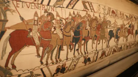 Reuters The Bayeux Museum showcases the Bayeux Tapestry, which portrays scenes from the 1066 Battle of Hastings, during its final days on view before the museum closes for renovations and transfers the historic embroidery to the British Museum, in Bayeux, France, August 29, 2025.