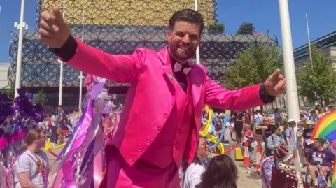 BBC Man in pink suit at Birmingham Pride