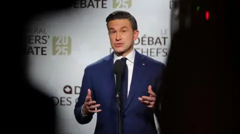 Conservative Leader Pierre Poilievre speaks with the media following a televised French language debate in Montreal, Quebec, Canada