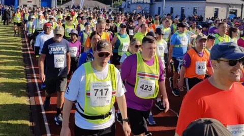 Isle of Man Parish Walk Hundreds of walkers on the start line of the parish walk last year. 