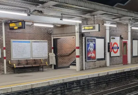 RAIB Platform empty shows Tube roundel and departure boards plus railway track