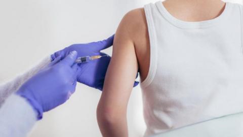 Boy being vaccinated - generic image 