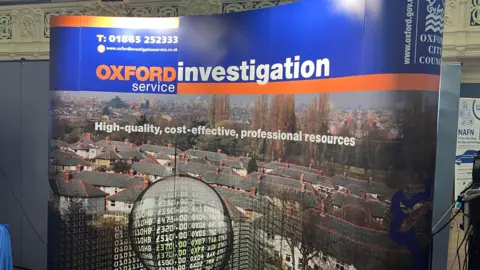 A sign at Oxford's annual Fraud Conference saying 