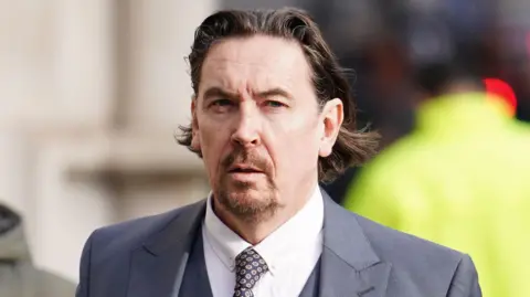 PA Media Richard Hall outside court - file