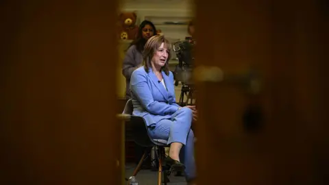 Getty Images Rachel Reeves during a media interview.