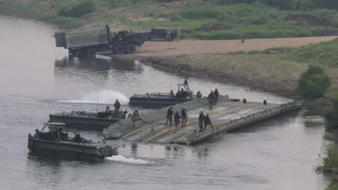 EPA US troops conduct a river-crossing drill on the Imjin River in Paju, South Korea