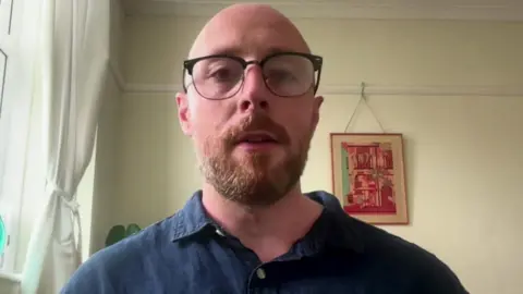 BBC Aleistair Adamson on a video call