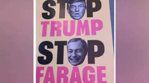 Sarah Leah Cobham A poster reads: Stop Farage Stop Trump