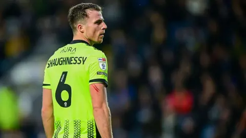 Portsmouth defender Conor Shaughnessy in action for the Blues 