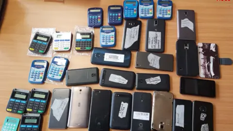 Surrey Police Phones and bank card readers found by police