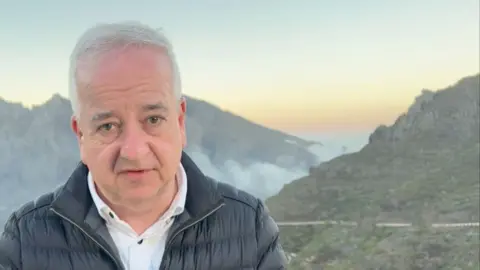 Nick Garnett in Tenerife with mountains in the background