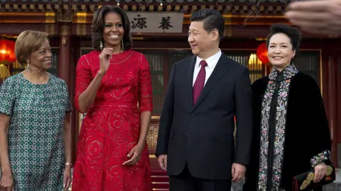 Getty Images Marian Robinson, Michelle Obama, Xi Jinping and his wife Peng Liyuan