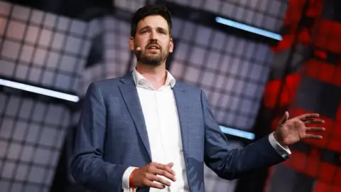 Vaughn Ridley/Collision via Sportsfile Sean Fraser, Minister of Immigration, Refugees & Citizenship, Government of Canada, on Centre stage during day one of Collision 2023 in Toronto, Canada