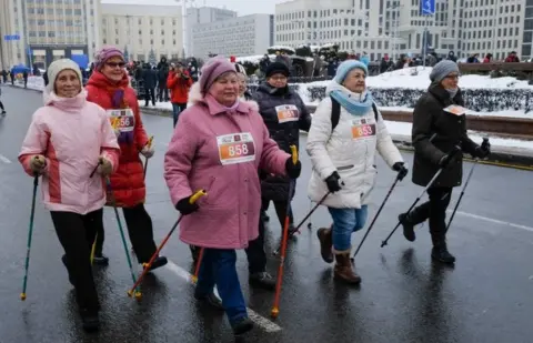 AFP/Getty Images Women take part in a "Beauty Run" in Minsk, Belarus