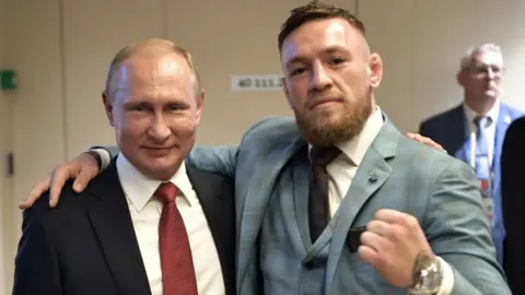 AFP Conor McGregor and Vladimir Putin