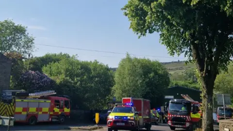 Oldham Council Fire service vehicles at scene