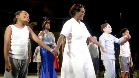 Getty Images Sharon D Clarke and the cast during the opening night curtain call for Caroline, Or Change on Broadway on 27 October 2021