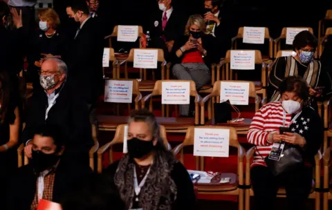 Reuters Audience members separated for social distancing wait for the start of the first 2020 presidential campaign debate