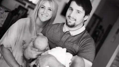 Family photo Lizzie and Danny Jones with their twins