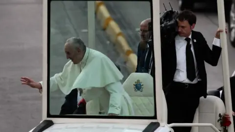 EPA Pope Francis (L) greets people from his Popemobile after arriving at the CATAM airfield in Bogotá, Colombia, 06 September 2017.