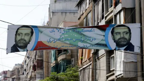 AFP/Getty Images A picture taken on November 5, 2017 shows a banner bearing a portrait of Lebanese Prime Minister Saad Hariri in the capital Beirut a day following the announcement of his resignation