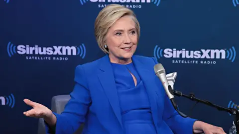 Getty Images Former Secretary of State Hillary Clinton joins SiriusXM for a town hall event hosted by Zerlina Maxwell at SiriusXM Studios in New York City.