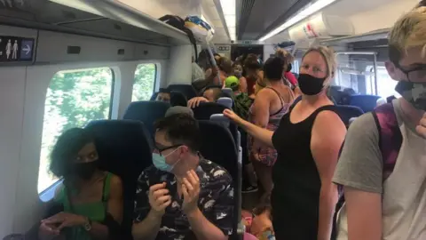 Packed train heading into Whitstable