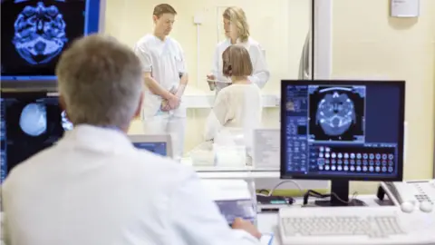 Getty Images Radiologist analysing x-rays