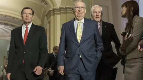 EPA Senate Majority Leader Republican Mitch McConnell (C), Republican Senator from Wyoming John Barrasso (L) and Republican Senator from Texas John Cornyn (R) walk to a news conference to discuss a Republican-crafted healthcare bill, on Capitol Hill in Washington, DC, USA, 20 June 2017.