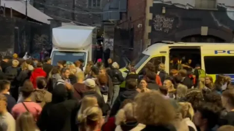 Martin Booth Crowds and police