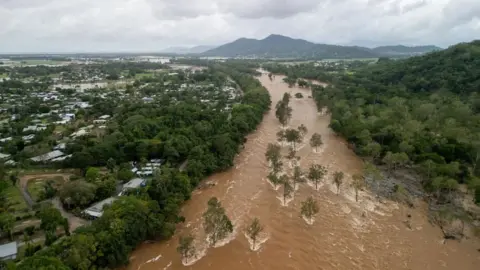 EPA An aerial view of floodwater near Cairns